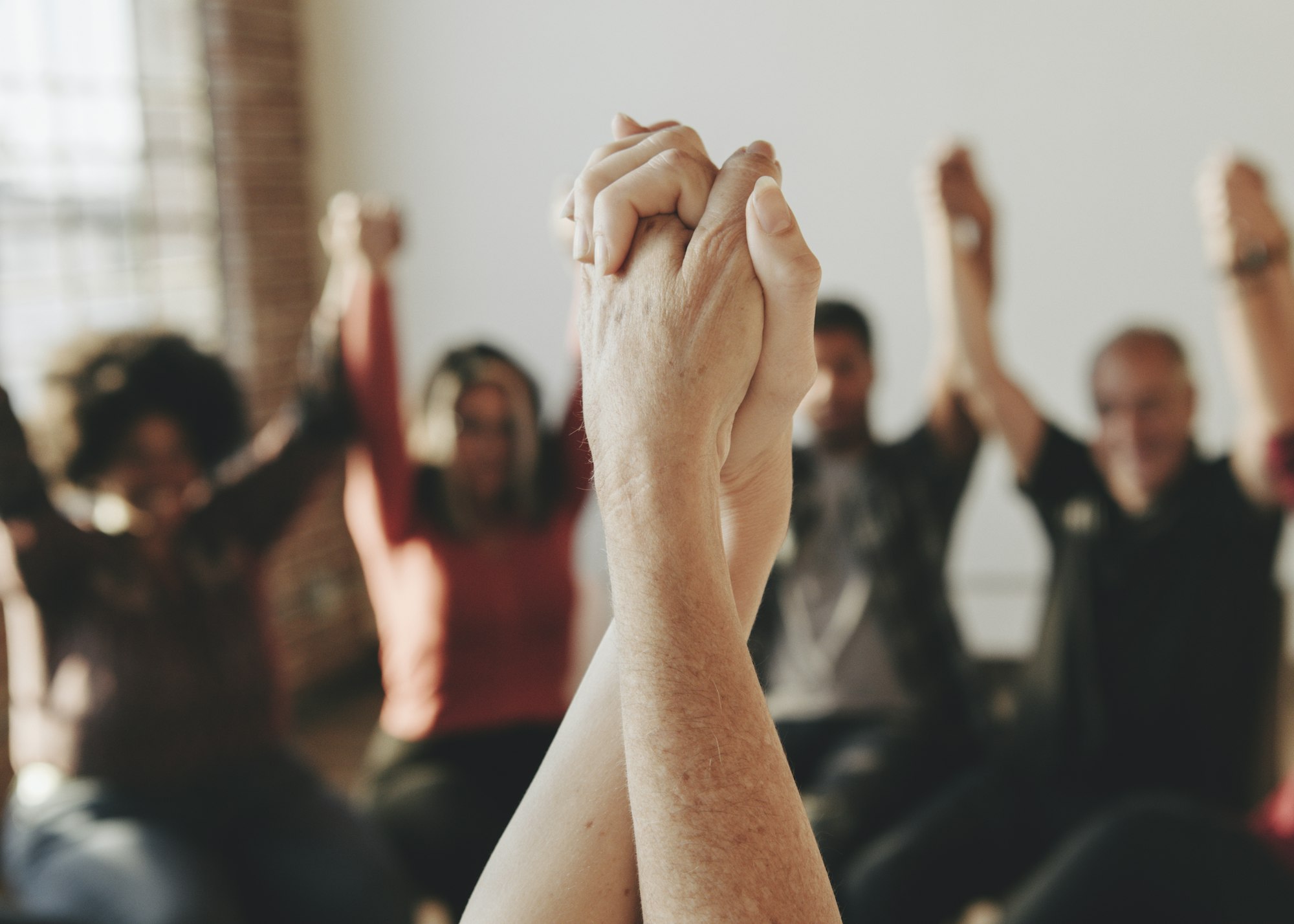 Rehab people holding hands